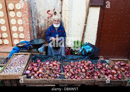 Man in his vegetables stall. Meknes medina, Morocco Stock Photo