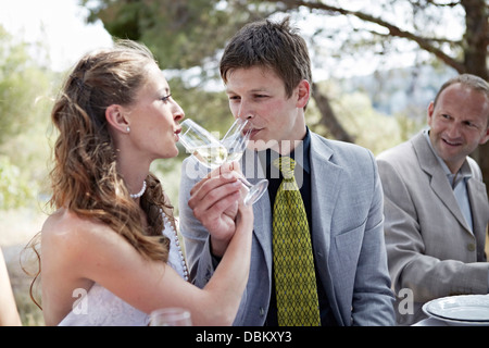 Bride And Groom Drinking Champagne, Croatia, Europe Stock Photo
