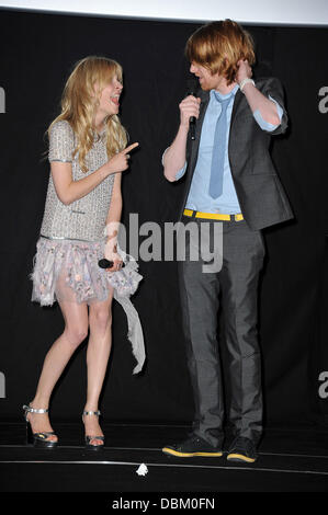 Clemence Poesy and Domhnall Gleeson,  at the 'Harry Potter and the Deathly Hallows, Part 2' premiere at Palais Omnisports de Bercy. Paris, France - 12.07.11 Stock Photo
