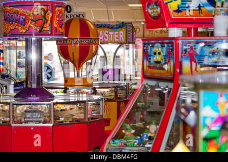 Fun at the amusements with the arcade machines, giving you the gambling chance to win or lose. Stock Photo