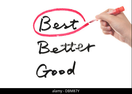 Choosing from good, better or best using a red pen on white board Stock Photo