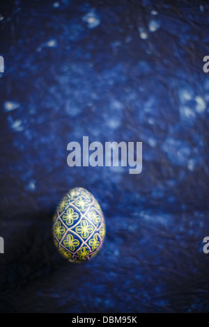 Easter Egg On Blue Background Stock Photo