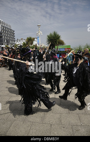 Hunters Moon morris dancers on sea front at Eastbourne Lammas Festival 2013 Stock Photo