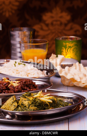 indian murgh palak and dhal with rice Stock Photo