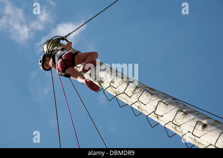 New Forest & Hampshire County Show, near Brockenhurst, Hampshire UK 1 August 2013. Thousand flock to the show on the last day as temperatures soar and the sun is shining. Climbing to the top Credit:  Carolyn Jenkins/Alamy Live News Stock Photo