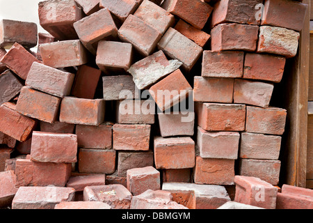 Pile of red construction bricks. Stock Photo