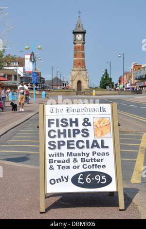 fish and chips special sign and clock tower, Skegness, Lincolnshire, England, UK Stock Photo