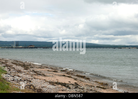 Looking across the Cromarty Firth towards the fabrication yards at Nigg from the village of Cromarty on the Black Isle. Stock Photo
