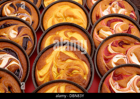Summer fruits tarts, Lemon tarts and Strawberry tarts on display Stock Photo