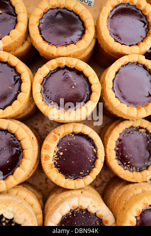 Raspberry Chocolate Tarts in a wooden box Stock Photo
