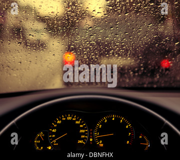 rain droplets on car windshield, blocked traffic Stock Photo