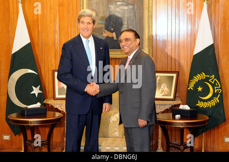 US Secretary of State John Kerry meets with Pakistani President Asif Ali Zardari August 1, 2013 in Islamabad, Pakistan. Stock Photo
