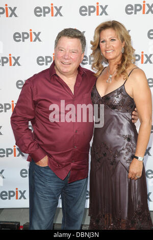 William Shatner with his wife Elizabeth Anderson EPIX free outdoor screening of 'The Captains' at the USS Intredpid Sea, Air and Space Museum New York City, USA - 30.07.11 Stock Photo