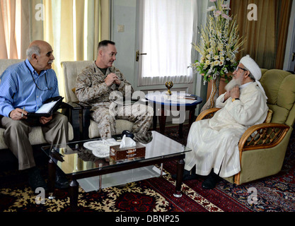 US Marine Corps Gen. Joseph F. Dunford Jr., commander of International Security Assistance Force visits Sebghatullah Mojaddedi, former president of Afghanistan and the Chairman of the Upper House of Parliament July 30, 2013 in Kabul, Afghanistan. Stock Photo