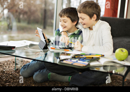 Two boys using digital tablet, Osijek, Croatia, Europe Stock Photo