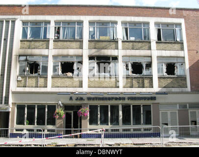 Smashed windows of the  JD Wetherspoon pub The aftermath of rioting in Woolwich, England on August 8, 2011 Police and fire crews were stretched to the limit after a third night of riots and looting across Greater London and parts of the UK following the s Stock Photo