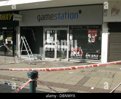 A wrecked Gamestation shop The aftermath of rioting in Woolwich, England on August 8, 2011 Police and fire crews were stretched to the limit after a third night of riots and looting across Greater London and parts of the UK following the shooting of Mark Stock Photo