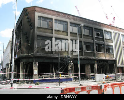 Burnt out JD Wetherspoon pub The aftermath of rioting in Woolwich, England on August 8, 2011 Police and fire crews were stretched to the limit after a third night of riots and looting across Greater London and parts of the UK following the shooting of Mar Stock Photo