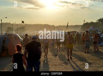 Kostrzyn, Poland. 01st Aug, 2013. People attend Przystanek Woodstock (Woodstock Station) in Kostrzyn, Poland, 01 August 2013. The festival's motto is 'Love, Friendship and Music' and is one of Europe's largest outdoor music festivals. Photo: Britta Pedersen/dpa/Alamy Live News Stock Photo