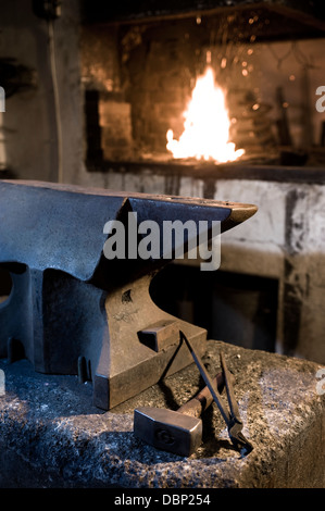 Anvil, tools and a forge in blacksmith shop, Landshut, Bavaria, Germany Stock Photo