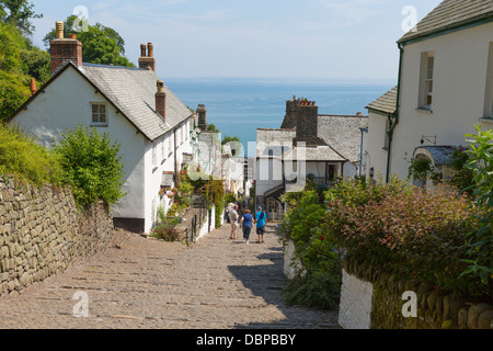 Clovelly street Devon England UK beautiful coast village and port, steep walk down to harbour on cobbled streets Stock Photo