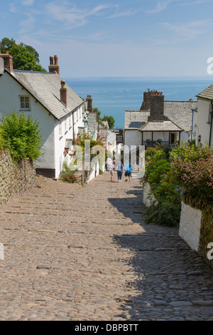 Clovelly street Devon England UK beautiful coast village and port, steep walk down to harbour on cobbled streets Stock Photo