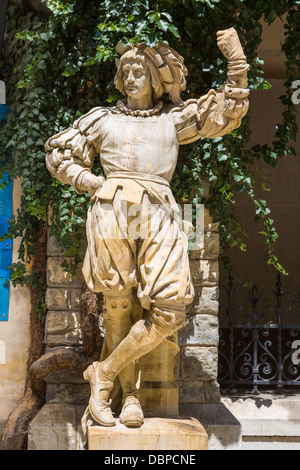 Medieval knight statue in the interior courtyard of Peles castle, Sinaia, Romania. Stock Photo