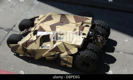 The Batplane is transported through a scene with a Batman figure in the cockpit on the set of the new Batman film 'Dark Knight Rises' filming in Pittsburgh  Pennsylvania, USA - 14.08.11 Stock Photo