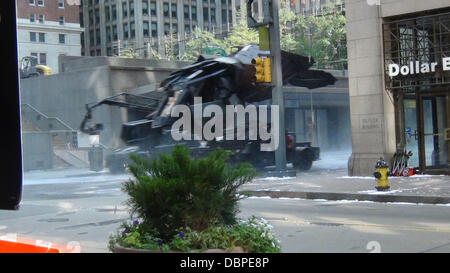 The Batplane is transported through a scene with a Batman figure in the cockpit on the set of the new Batman film 'Dark Knight Rises' filming in Pittsburgh  Pennsylvania, USA - 14.08.11 Stock Photo