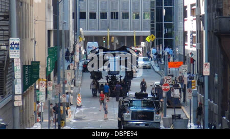 The Batplane is transported through a scene with a Batman figure in the cockpit on the set of the new Batman film 'Dark Knight Rises' filming in Pittsburgh  Pennsylvania, USA - 14.08.11 Stock Photo