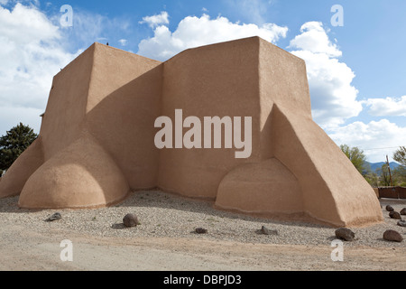 The iconic Saint Francis church in Ranchos de Taos New Mexico, USA, has inspired artists such as Ansel Adams. Stock Photo