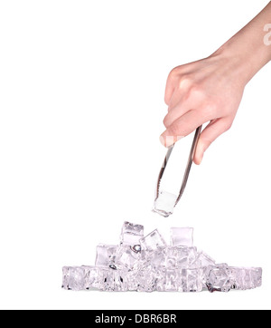 Ice cubes isolated on a white background with hand and tongs Stock Photo