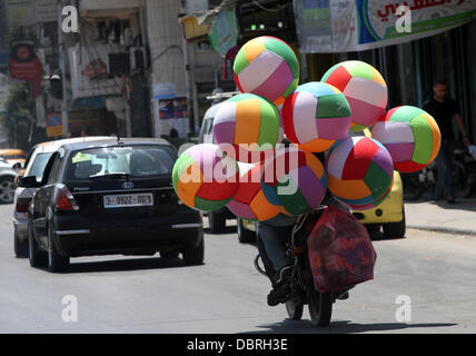 Aug. 3, 2013 - Gaza, Gaza Strip, Palestinian Territory - A Palestinian vendor sells balloons in Gaza city 03 August 2013  (Credit Image: © Mohammed Asad/APA Images/ZUMAPRESS.com) Stock Photo