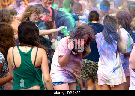 Matlock, Derbyshire, UK. 3rd August 2013. Festival goers take part in a Paint fight at Y Not Festival in Matlock, Derbyshire, 3rd August 2013. Credit:  Alex Williams/Alamy Live News Stock Photo