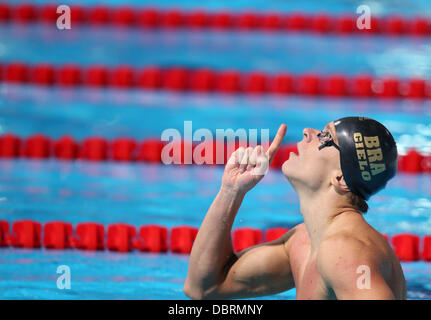 Barcelona, Spain. 03rd Aug, 2013. Cesar Cielo Filho of Brazil celebrates after winning the men's 50m freestyle final of the 15th FINA Swimming World Championships at Palau Sant Jordi Arena in Barcelona, Spain, 03 August 2013. Photo: Friso Gentsch/dpa/Alamy Live News Stock Photo