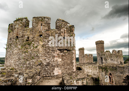 Conwy Castle is a medieval castle built by Edward I in the late 13th century. It forms part of a walled town of Conwy and occupies a strategic point on the River Conwy. It is listed as a World Heritage Site. Stock Photo