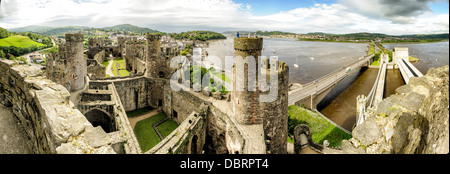 CONWY, Wales - Conwy Castle is a medieval castle built by Edward I in the late 13th century. It forms part of a walled town of Conwy and occupies a strategic point on the River Conwy. It is listed as a World Heritage Site. Stock Photo