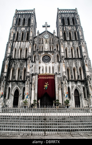 HANOI, Vietnam — St. Joseph's Cathedral is a church on Nha Tho (Church) Street in the Hoan Kiem District of Hanoi, Vietnam. The late 19th-century Gothic Revival (Neo-Gothic style) church serves as the cathedral of the Roman Catholic Archdiocese of Hanoi to nearly 4 million Catholics in the country. Stock Photo