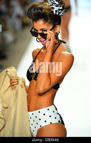 MIAMI BEACH, FL - JULY 20: A model walks the runway at the Nicolita show during Mercedes-Benz Fashion Week Swim 2014 at the Raleigh on July 20, 2013 in Miami Beach, Florida. Stock Photo