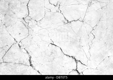 Cracks in the marble pattern tile wall. Stock Photo