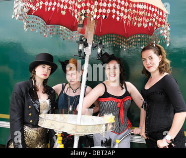 fordshire, UK, 03/08/2013 : Standon Calling Festival. Atmosphere, attendees in fancy dress to the theme of 'Running away from the Circus'. Picture by Julie Edwards Stock Photo