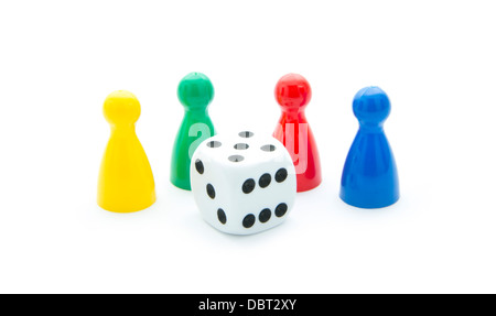 colorful play figures with dice isolated on white background Stock Photo