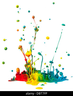 Colorful paint splashing on white background Stock Photo