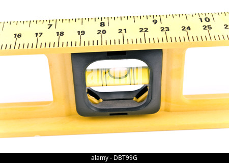 Macro of a yellow spirit level on white Stock Photo