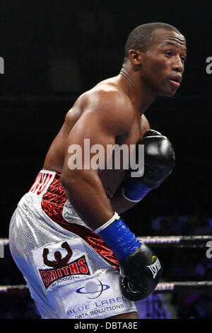 Uncasville, Connecticut, USA. 4th Aug, 2013. August 3, 2013: Thabiso Mchunu (white trunks) during his NBC Sports Fight Night 10 round cruiserweight bout at Mohegan Sun Arena. Mchunu defeated Chambers via unanimous decision. Anthony Nesmith/CSM/Alamy Live News Stock Photo