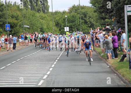 Prudential RideLondon London-Surrey Classic. Sunday 4th August 2013. 150 top international professional cyclists compete around a 137.2mile circuit which roughly follows the London 2012 Olympic Road Race route. Peloton at East Molesey, Surrey, England, UK. Credit:  Ian Bottle/Alamy Live News Stock Photo