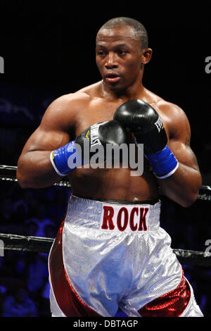 Uncasville, Connecticut, USA. 4th Aug, 2013. August 3, 2013: Thabiso Mchunu (white trunks) during his NBC Sports Fight Night 10 round cruiserweight bout at Mohegan Sun Arena. Mchunu defeated Chambers via unanimous decision. Anthony Nesmith/CSM/Alamy Live News Stock Photo