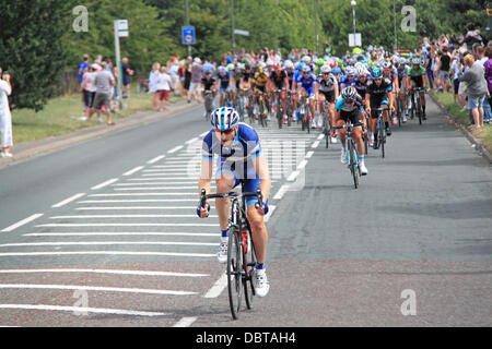 Prudential RideLondon London-Surrey Classic. Sunday 4th August 2013. 150 top international professional cyclists compete around a 137.2mile circuit which roughly follows the London 2012 Olympic Road Race route. Peloton at East Molesey, Surrey, England, UK. Credit:  Ian Bottle/Alamy Live News Stock Photo