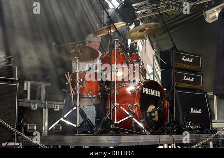 Ayr, UK. 4th Aug, 2013.  Jam at the Dam Music festival in aid of 'Cash for Kids'. Event organiser and drummer of the band Payche Brian McKinlay. Credit:  Maurice Morwood/Alamy Live News Stock Photo