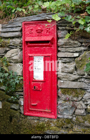 An Edwardian post box in a lakeland wall. Cumbria North West England. Lake District Stock Photo